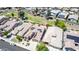 Gorgeous home situated near green spaces, desert landscaping, and other homes at 18072 W Paradise Ln, Surprise, AZ 85388