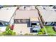 Aerial view shows the home with desert landscaping, a gazebo, and an open patio space at 18072 W Paradise Ln, Surprise, AZ 85388