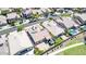 Aerial view of the home in a neighborhood with a desert landscaped backyard and a gazebo at 18072 W Paradise Ln, Surprise, AZ 85388