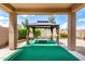 Backyard gazebo featuring covered seating area at 18072 W Paradise Ln, Surprise, AZ 85388