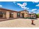 Backyard featuring a gazebo, patio, and desert landscaping at 18072 W Paradise Ln, Surprise, AZ 85388