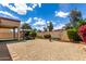 Backyard featuring desert landscaping, gazebo, and covered patio at 18072 W Paradise Ln, Surprise, AZ 85388