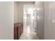 Hallway featuring tile floors, built in cabinets with stone counters and recessed lighting at 18072 W Paradise Ln, Surprise, AZ 85388