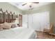 Comfortable bedroom with plenty of space, natural light and a large sliding door closet at 18482 W Marconi Ave, Surprise, AZ 85388