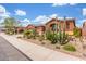 View of a house featuring desert landscaping with various cacti and succulents along the sidewalk at 18482 W Marconi Ave, Surprise, AZ 85388