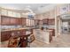 Spacious kitchen featuring granite countertops, stainless steel appliances, and custom cabinetry at 18482 W Marconi Ave, Surprise, AZ 85388