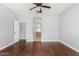 Spacious bedroom with wood floors and access to an ensuite bathroom at 18775 E Seagull Dr, Queen Creek, AZ 85142