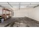 Spacious garage with shelving, ready for customization and storage solutions at 18775 E Seagull Dr, Queen Creek, AZ 85142