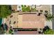 Aerial view showcases the property's tile roof, private backyard, and landscaping, offering a bird's eye perspective at 19942 N 108Th Ave, Peoria, AZ 85373