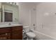 Bathroom featuring a vanity, toilet and tub, offering a practical and clean space at 19942 N 108Th Ave, Peoria, AZ 85373
