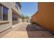 Backyard features a stone patio, block wall and partial landscaping at 20045 N 49Th Dr, Glendale, AZ 85308