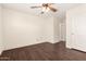 Unfurnished bedroom with hardwood floors, ceiling fan and natural light at 20045 N 49Th Dr, Glendale, AZ 85308