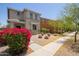 Attractive two-story home featuring low maintenance landscaping, stone accents, and desert foliage at 20045 N 49Th Dr, Glendale, AZ 85308