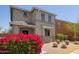 Inviting two-story home with stone accents, low maintenance landscaping, and desert foliage at 20045 N 49Th Dr, Glendale, AZ 85308