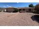 Charming single story home with desert landscaping, neutral color palette, and brick walkway leading to entrance at 2022 Leisure World --, Mesa, AZ 85206