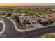 A high angle view of a residential community featuring attractive single-story homes with desert landscaping at 20506 N 271St Ave, Buckeye, AZ 85396