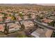 A high altitude shot of a Primary planned community located in the desert landscape of Arizona at 20506 N 271St Ave, Buckeye, AZ 85396