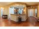 Spacious kitchen with wood cabinetry, granite countertops, and pendant lighting at 20506 N 271St Ave, Buckeye, AZ 85396