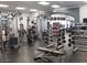Well-equipped exercise room with modern weight machines and equipment for a full-body workout, promoting healthy living at 21218 N Aurora Dr, Sun City West, AZ 85375