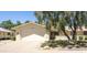 Charming single-story home with a well-maintained lawn and a two-car garage, offering comfort and convenience at 21218 N Aurora Dr, Sun City West, AZ 85375