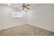 Bedroom with carpet and a ceiling fan at 233 E Cairo Dr, Tempe, AZ 85282