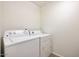 Practical laundry room featuring side by side washer and dryer at 233 E Cairo Dr, Tempe, AZ 85282