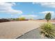 Expansive backyard featuring desert landscaping, offering privacy and a natural setting at 2609 W Lavitt Ln, Phoenix, AZ 85086