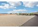 Spacious backyard with desert landscaping and mountain views, perfect for outdoor activities at 2609 W Lavitt Ln, Phoenix, AZ 85086