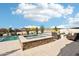 Inviting pool and spa with a fire pit and comfortable lounge chairs, creating an ideal outdoor retreat at 2609 W Lavitt Ln, Phoenix, AZ 85086