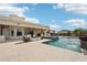 Stunning backyard pool and covered patio, perfect for outdoor entertaining and enjoying the serene desert landscape at 2609 W Lavitt Ln, Phoenix, AZ 85086