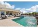 Gorgeous backyard pool area with a fire pit, spa, and patio, perfect for relaxing and enjoying the Arizona sunshine at 2609 W Lavitt Ln, Phoenix, AZ 85086