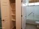 Bright bathroom featuring a walk-in shower, a linen closet and updated fixtures at 2611 E San Paulo Dr, Casa Grande, AZ 85194