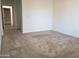 Bedroom with a neutral carpet, providing a blank canvas for personalization and decor at 2611 E San Paulo Dr, Casa Grande, AZ 85194