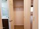 View of a closet with hanging rod and a bathroom with a sink and vanity nearby at 2611 E San Paulo Dr, Casa Grande, AZ 85194