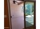 Covered patio featuring neutral tones, ceiling fan and sliding glass doors leading to the backyard at 2611 E San Paulo Dr, Casa Grande, AZ 85194