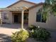 Covered patio with decorative pergola and a landscaped backyard at 2611 E San Paulo Dr, Casa Grande, AZ 85194