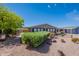 Charming home with tidy front yard, gravel landscaping and covered parking at 2807 W Gregory St, Apache Junction, AZ 85120