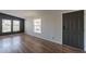 Bright living room features updated floors, fresh paint, and ample natural light at 2807 W Gregory St, Apache Junction, AZ 85120