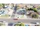 Aerial view of a beautifully landscaped home with a backyard pool and manicured landscaping at 2905 W Campo Bello Dr, Phoenix, AZ 85053
