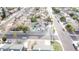 Aerial view of a pristine residence featuring a backyard pool, nestled among well-maintained homes at 2905 W Campo Bello Dr, Phoenix, AZ 85053