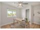 Charming bedroom featuring desk with decor, closet, and a bright window with a view at 2905 W Campo Bello Dr, Phoenix, AZ 85053