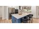 Spacious kitchen showcases a large island, stainless steel refrigerator and range hood at 2905 W Campo Bello Dr, Phoenix, AZ 85053