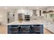 Bright kitchen featuring a large island with seating, stainless steel appliances, and ample counter space at 2905 W Campo Bello Dr, Phoenix, AZ 85053
