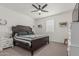 Bright bedroom with a ceiling fan, neutral walls, and comfortable carpet, offering a serene and relaxing retreat at 2923 W Shanley Ave, Apache Junction, AZ 85120