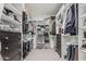 Spacious walk-in closet with custom shelving and storage, providing ample room for organization and wardrobe display at 2923 W Shanley Ave, Apache Junction, AZ 85120