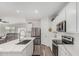 Modern kitchen boasts a center island, stainless steel appliances and ample counter space at 2923 W Shanley Ave, Apache Junction, AZ 85120