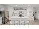 Stylish kitchen with stainless steel appliances, pendant lighting, and an island with seating at 2923 W Shanley Ave, Apache Junction, AZ 85120