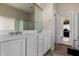 The bathroom features a double sink vanity and a separate tub and shower at 3022 W Redwood Ln, Phoenix, AZ 85045