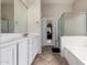 The bathroom features a double sink vanity, a separate tub and shower, and tile flooring at 3022 W Redwood Ln, Phoenix, AZ 85045