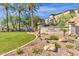 Entrance to the Cachet at the Legacy community, enhanced by landscaping and a stone entry sign at 3131 E Legacy Dr # 1057, Phoenix, AZ 85042